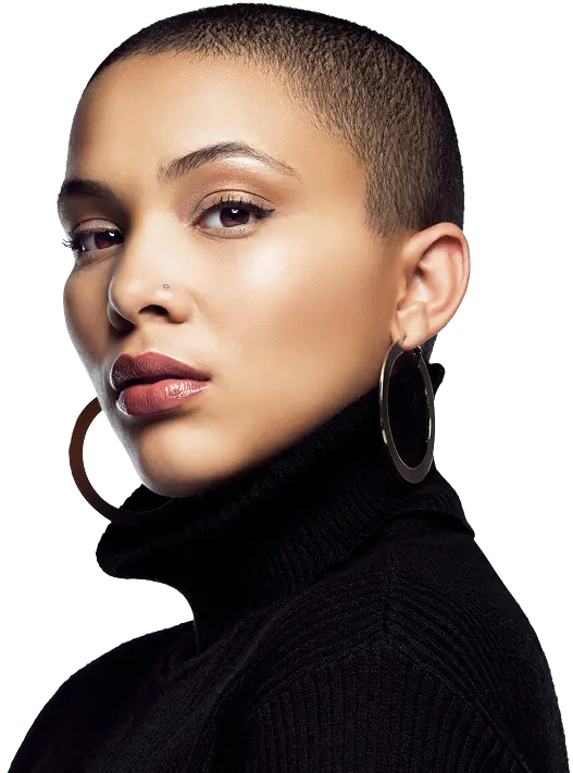 Model wearing a black turtleneck and hoop earrings